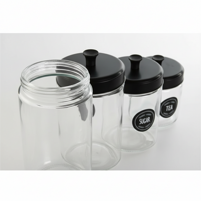 Set de 4 Botes de Cristal con Tapa en Metal Negro | Home ESPRIT